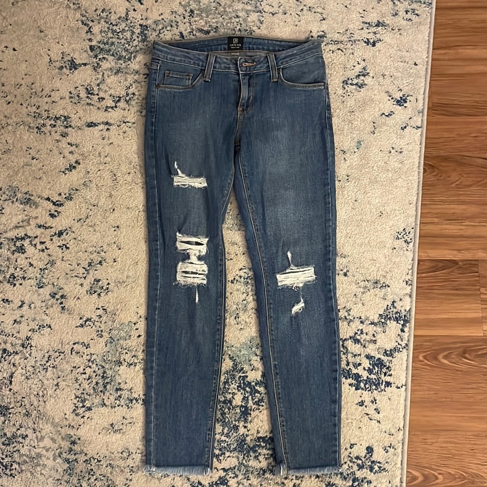Light blue skinny jeans with tags!